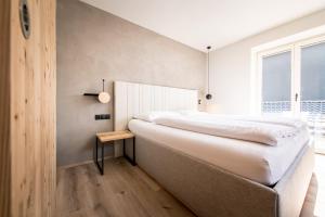 Posteľ alebo postele v izbe v ubytovaní Hotel Sonnenheim