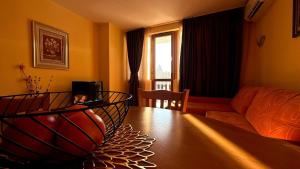 Posezení v ubytování Апартаменти Хармония