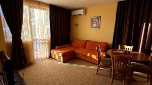 Posezení v ubytování Апартаменти Хармония