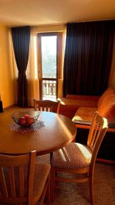 Posezení v ubytování Апартаменти Хармония