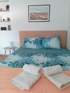 Postel nebo postele na pokoji v ubytování Fina Apartman