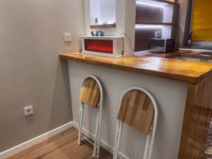 a kitchen with a counter with a toaster oven on it at Merdan Sarajevo in Sarajevo