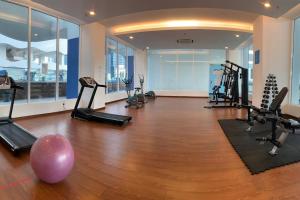 a gym with treadmills and exercise equipment in a building at Melaka Penthouse 8-10 Pax 3 Rooms 3 Bathroom 2 Carparks in Malacca