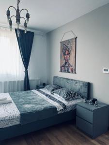 Ένα ή περισσότερα κρεβάτια σε δωμάτιο στο Apartament acasă