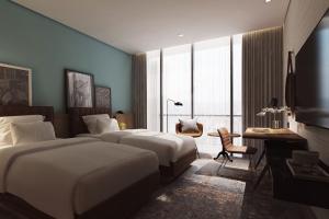 Letto o letti in una camera di Four Points by Sheraton Dakar Diamniadio
