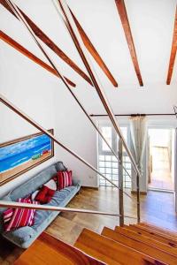 Posteľ alebo postele v izbe v ubytovaní Acogedor Dúplex con terraza interior en la playa