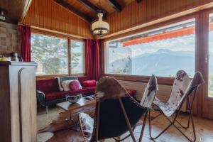 Galería fotográfica de Magnifique chalet mitoyen avec vue sur les montagnes en Crans-Montana
