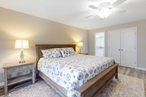 a bedroom with a bed and a ceiling fan at Sea Colony - 606 Dover House Rd. in Bethany Beach +35 photos