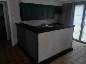 Kuchyň nebo kuchyňský kout v ubytování Cama