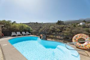 a swimming pool with a view of a mountain at La Venta in Las Vegas