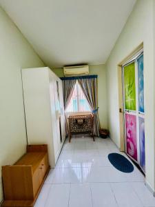 Fotografie z fotogalerie ubytování Jizek Homestay Bajet v destinaci Rawang