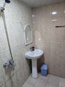 Ένα μπάνιο στο Mziuri Cozy Guesthouse