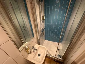 Koupelna v ubytování Crimpers Cottage + 17 fotografií