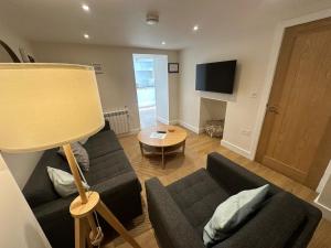 TV a/nebo společenská místnost v ubytování Crimpers Cottage