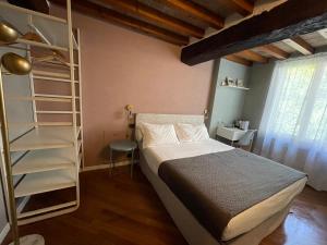 Postel nebo postele na pokoji v ubytování Le Camere di Bsuites Affittacamere