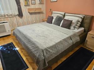 Posteľ alebo postele v izbe v ubytovaní Habos isler apartman 16