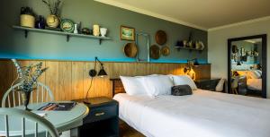 Ένα ή περισσότερα κρεβάτια σε δωμάτιο στο Malia Spa and Resort inc