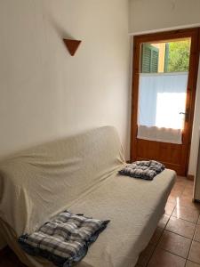 Postel nebo postele na pokoji v ubytování Casa Isabella