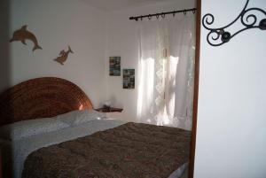 Postel nebo postele na pokoji v ubytování Casa Isabella