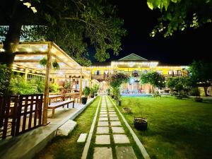 Zahrada ubytování Kim An Homestay, Pizza - Cafe