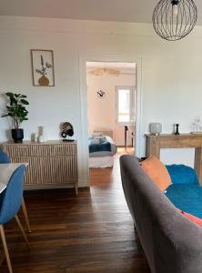 Χώρος καθιστικού στο Appartement douillet