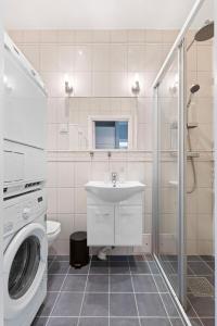 Ένα μπάνιο στο Modern and bright apartment in central Oslo