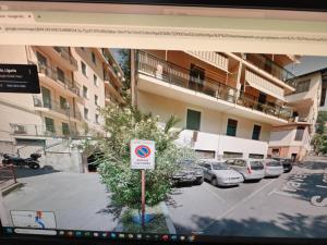 a picture of a parking lot with a no parking sign at Sea La Vie in Moneglia