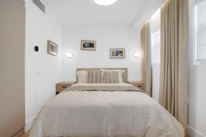Ένα ή περισσότερα κρεβάτια σε δωμάτιο στο Vonder Miami Beach - Unit 19