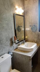 Koupelna v ubytování Sigiri Lanka Resort