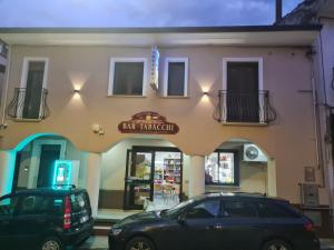 a building with a car parked in front of it at Casa Vacanza da Patty in San Rufo