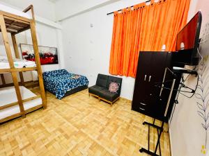Postel nebo postele na pokoji v ubytování Hostal Badillo SV