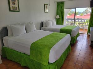 Voodi või voodid majutusasutuse Jolly Beach Antigua - All Inclusive toas