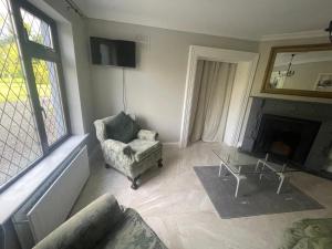 Зона вітальні в Self Contained Ensuite Double Room With Private Sitting Room