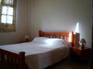 Giường trong phòng chung tại Abri Gens Libres