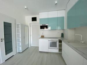 Dapur atau dapur kecil di Azure Bay Residence +6 gambar