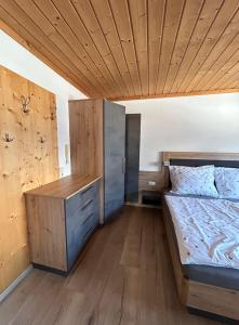 Кровать или кровати в номере Ferienwohnung für alle Sportbegeisterten