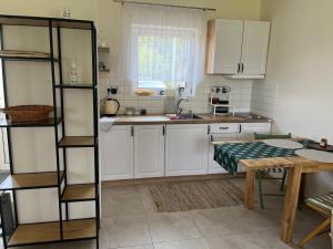 Kuchyňa alebo kuchynka v ubytovaní Котедж Gasthof Dresden