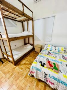 Postel nebo postele na pokoji v ubytování Hostal Badillo SV