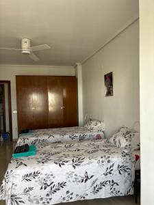 Postel nebo postele na pokoji v ubytování CA LAU
