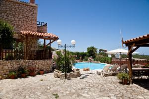 The swimming pool at or close to Tsivaras Villas