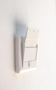 a white light switch on a white wall at Colours Plus in Sarajevo