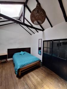 Ein Bett oder Betten in einem Zimmer der Unterkunft Intro Hostels Cusco