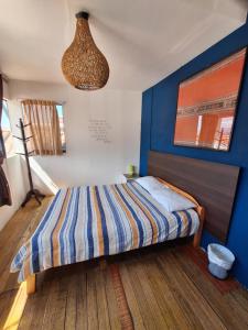 Ein Bett oder Betten in einem Zimmer der Unterkunft Intro Hostels Cusco