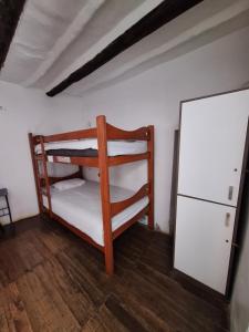 Ein Bett oder Betten in einem Zimmer der Unterkunft Intro Hostels Cusco