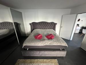 Postel nebo postele na pokoji v ubytování V.I.P Appartement