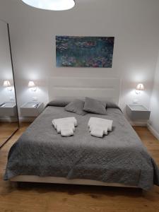 Posteľ alebo postele v izbe v ubytovaní Luxury Apartament's Celso