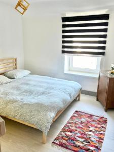Postel nebo postele na pokoji v ubytování Appartement Ô Tranquil