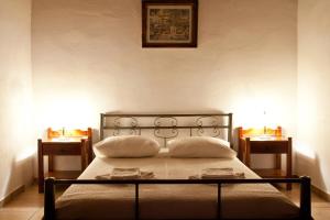 A bed or beds in a room at Tsivaras Villas