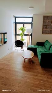 Posezení v ubytování APARTAHOTEL MADRID URBAN SUITES - EDIFICIO EXCLUSIVO- 7 Apartments Boutique Full Equiped