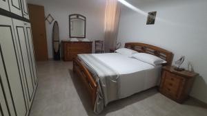 Postel nebo postele na pokoji v ubytování CasaMaPiè Binetto
